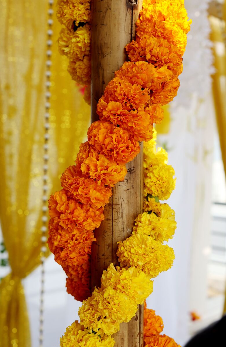Stock photo: marigold flower garlands used as festive decor for community events