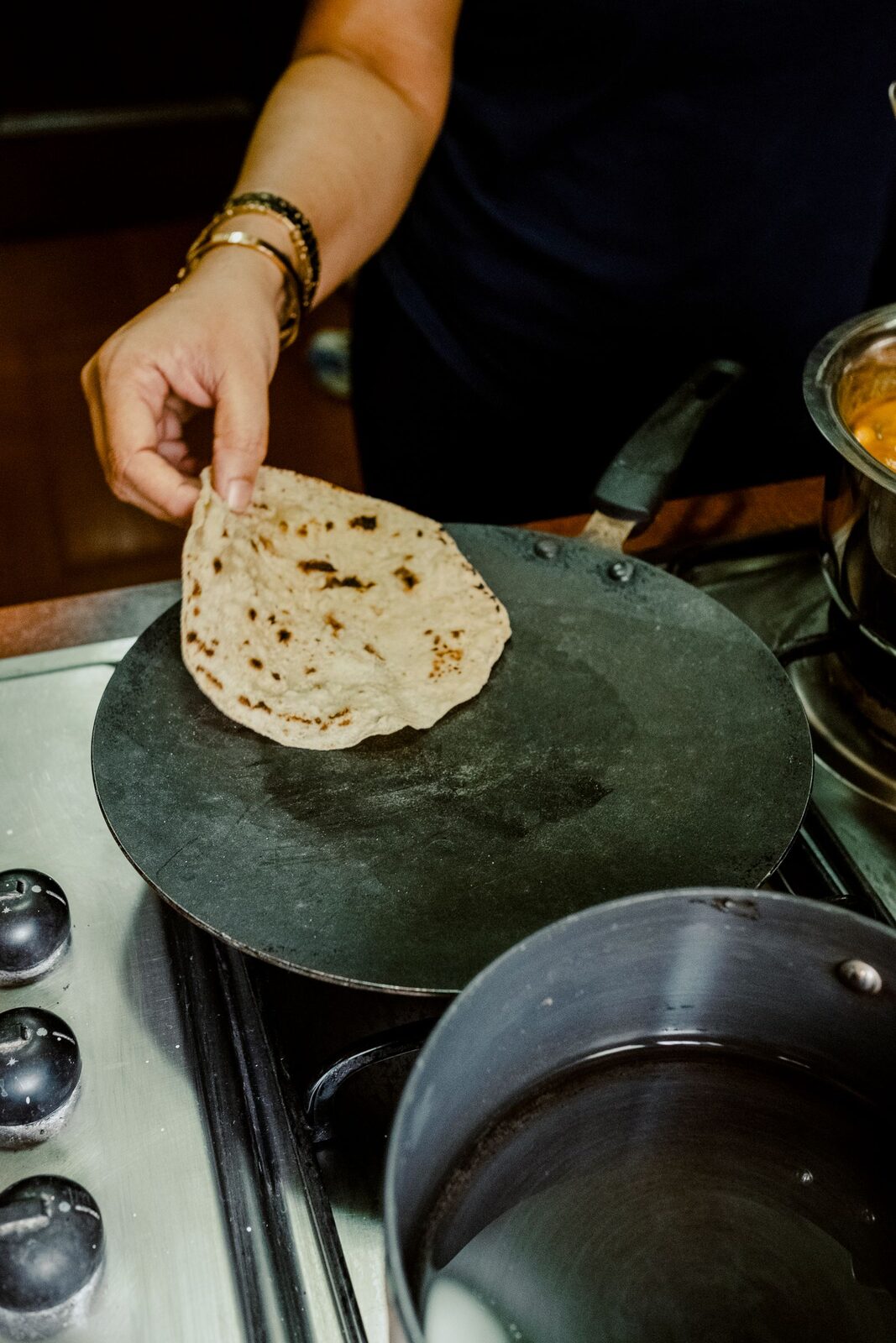 Stock photo: fresh roti being cooked on a tawa